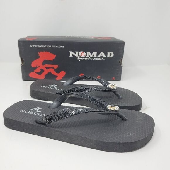 Brand new nomad footwear flip flops
Black with jew - Picture 1 of 4